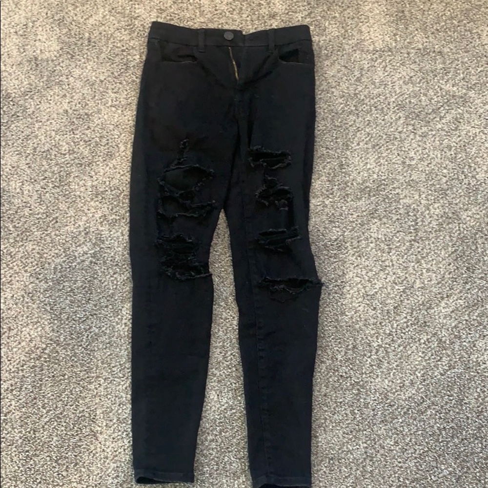 black american eagle skinny jeans with rips